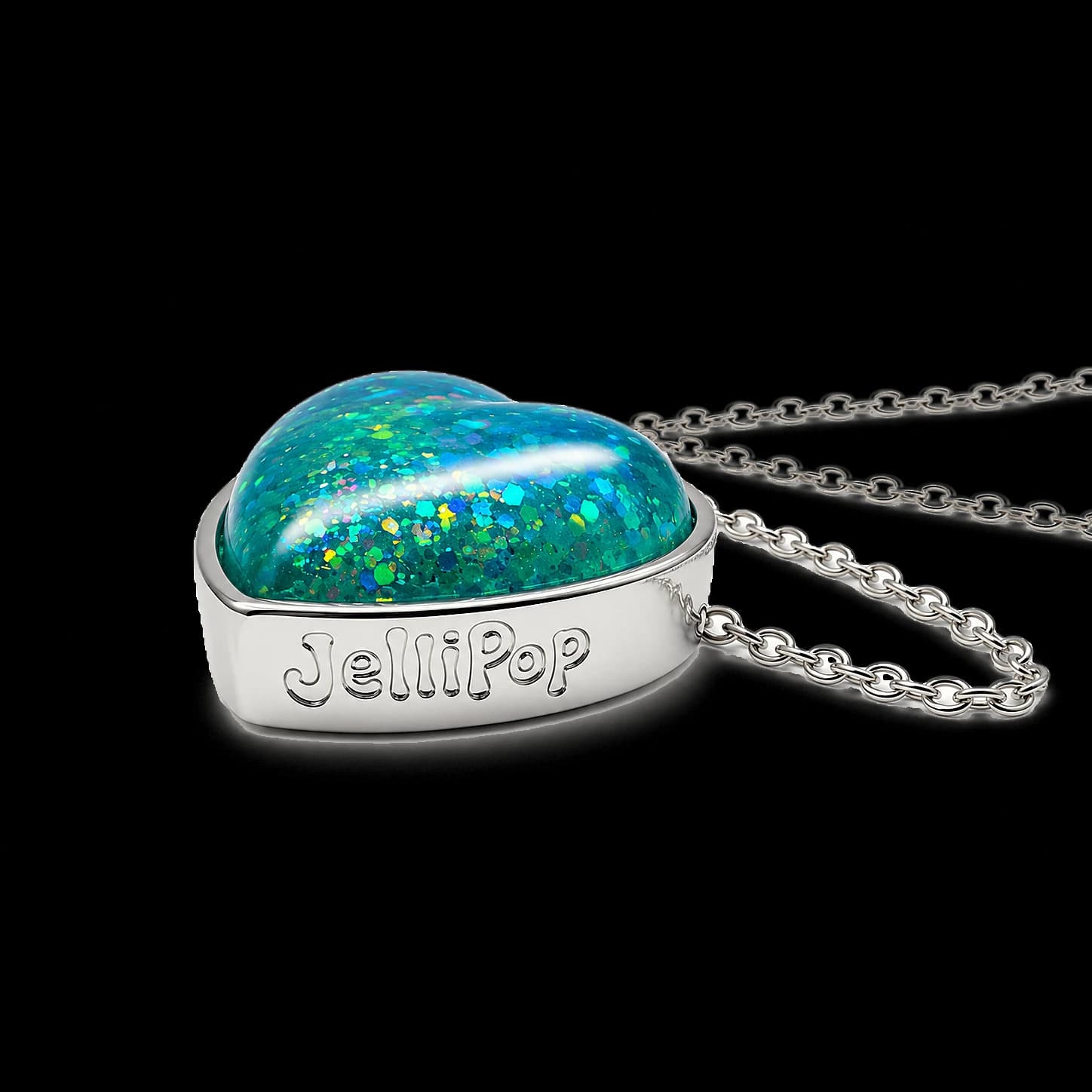 Ocean Calm pendant on its side, JelliPop embossed along the bezel